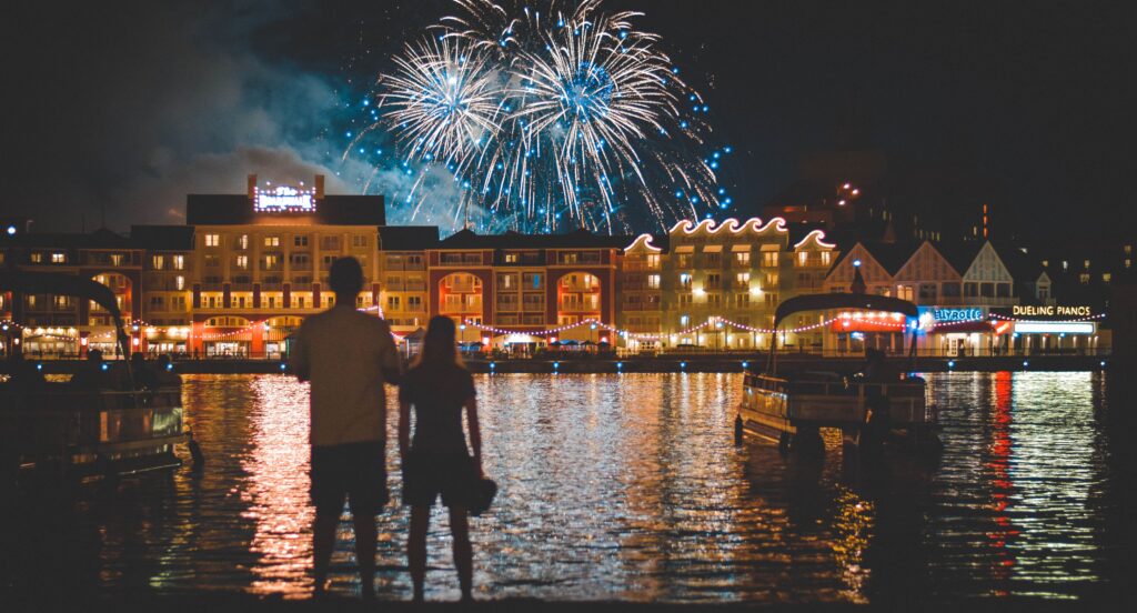 A couple watching the fireworks at Disney World